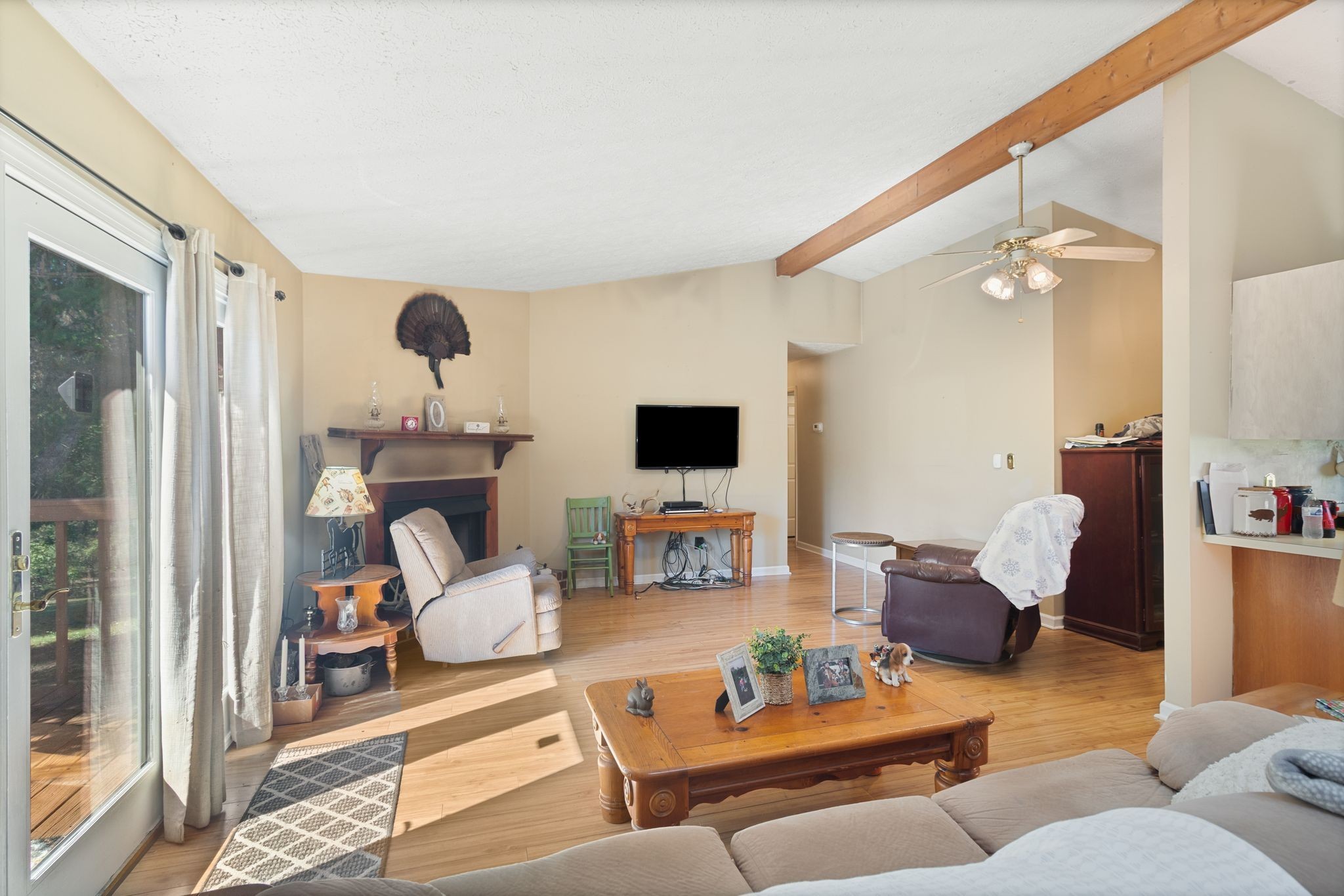 10373 Spanntown Road Arrington, TN 37014 - Photo 12 of 23 a living room with furniture and a flat screen tv