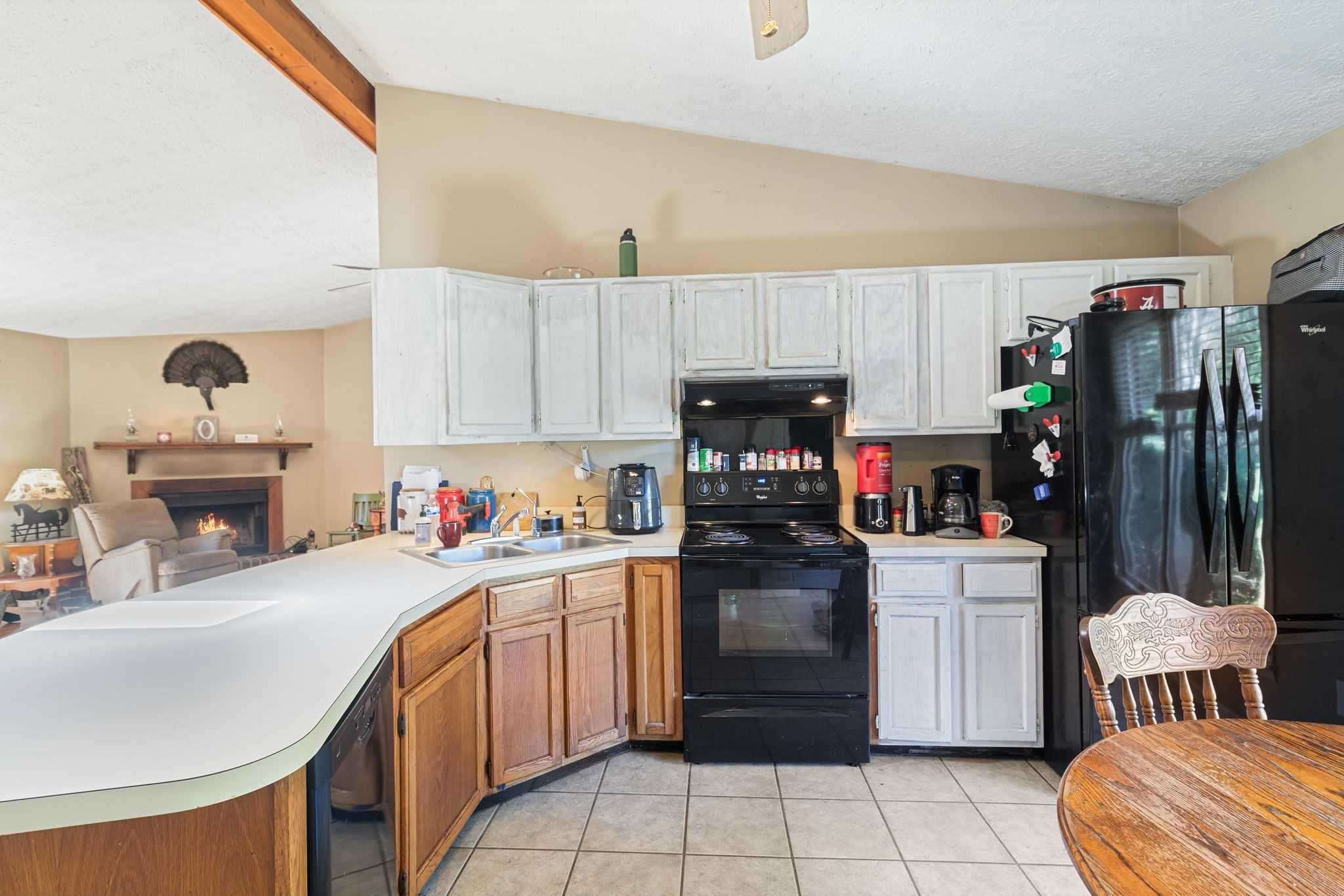 10373 Spanntown Road Arrington, TN 37014 - Photo 14 of 23 a kitchen with a sink a stove and cabinets