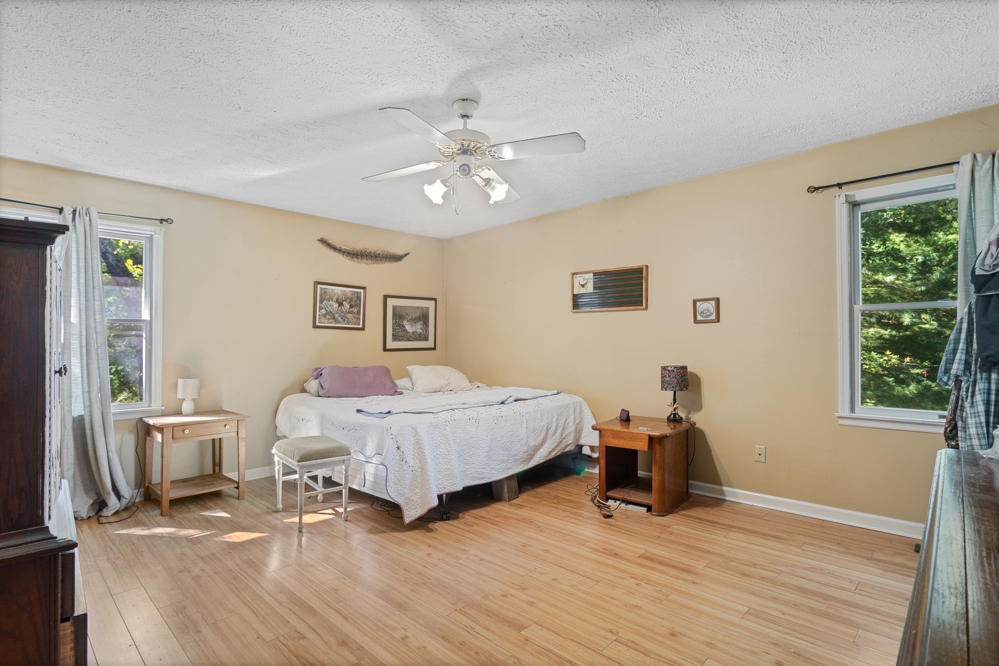 10373 Spanntown Road Arrington, TN 37014 - Photo 16 of 23 a spacious bedroom with a bed and a table in it