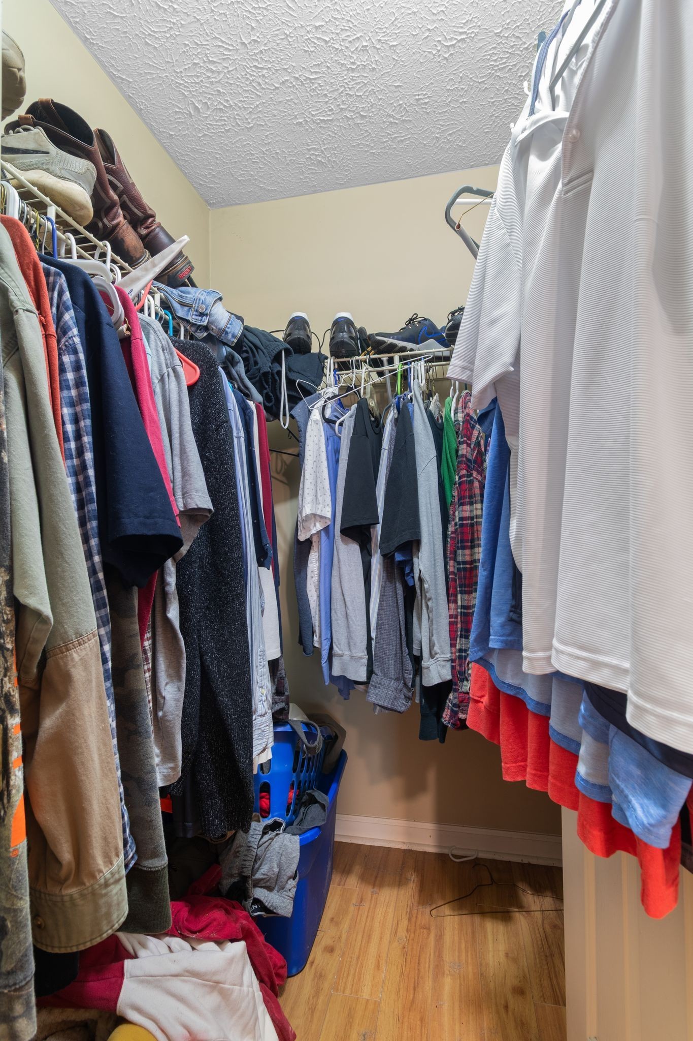 10373 Spanntown Road Arrington, TN 37014 - Photo 20 of 23 a view of walk in closet with clothes and shoes