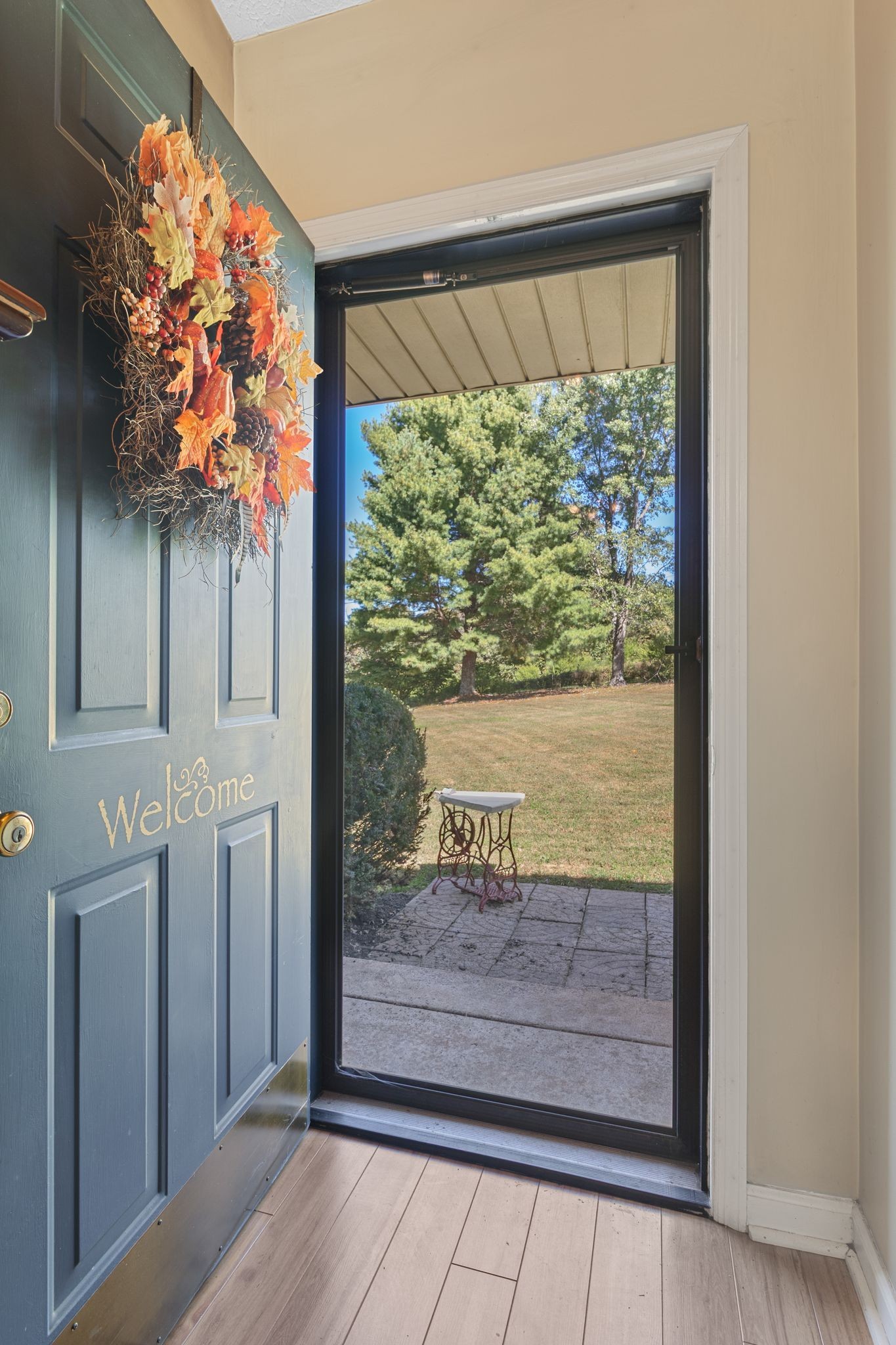 10373 Spanntown Road Arrington, TN 37014 - Photo 23 of 23 a view of a livingroom with wooden floor and a chandelier
