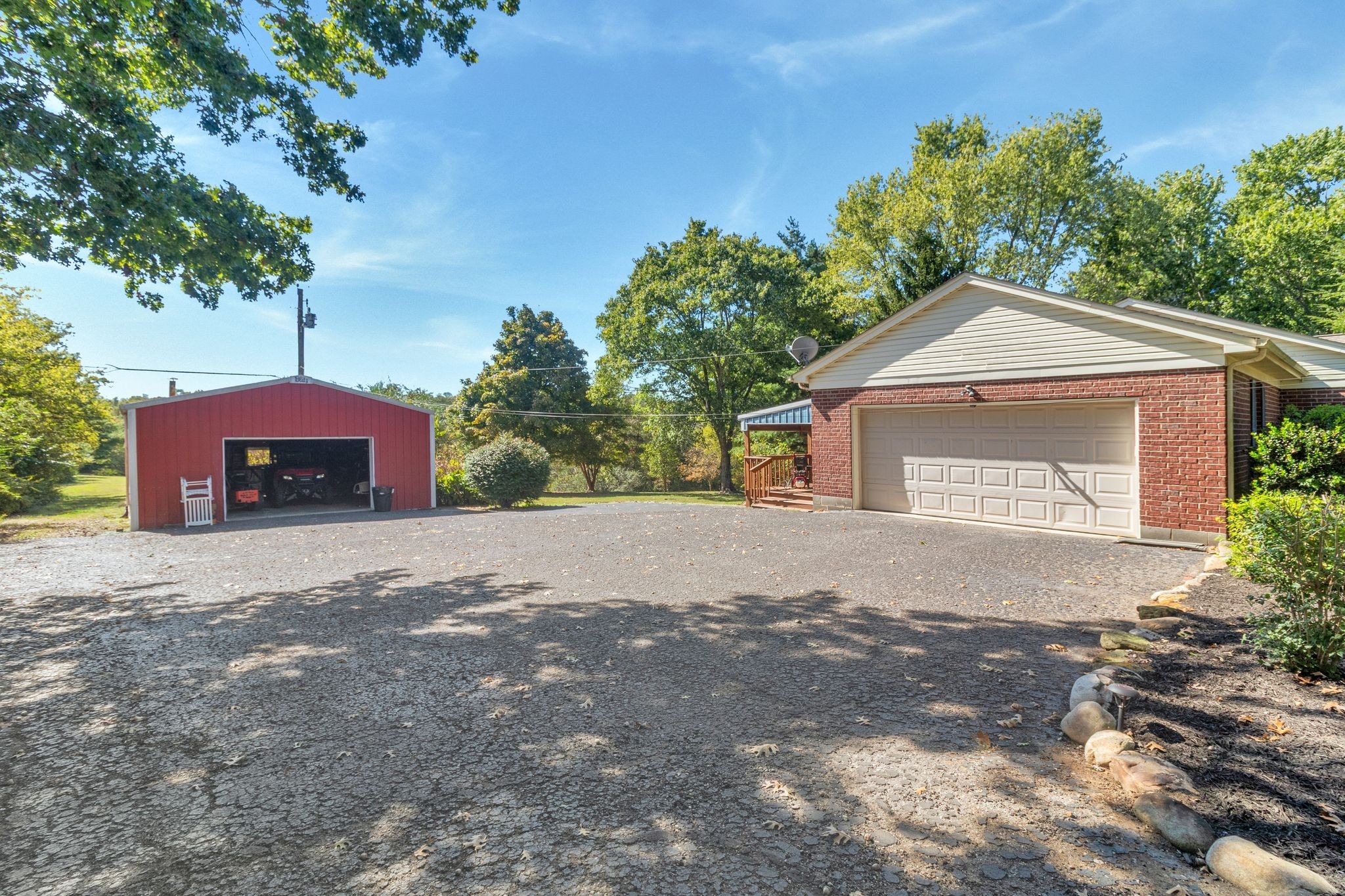 10373 Spanntown Road Arrington, TN 37014 - Photo 9 of 23 a front view of a house with a yard and garage