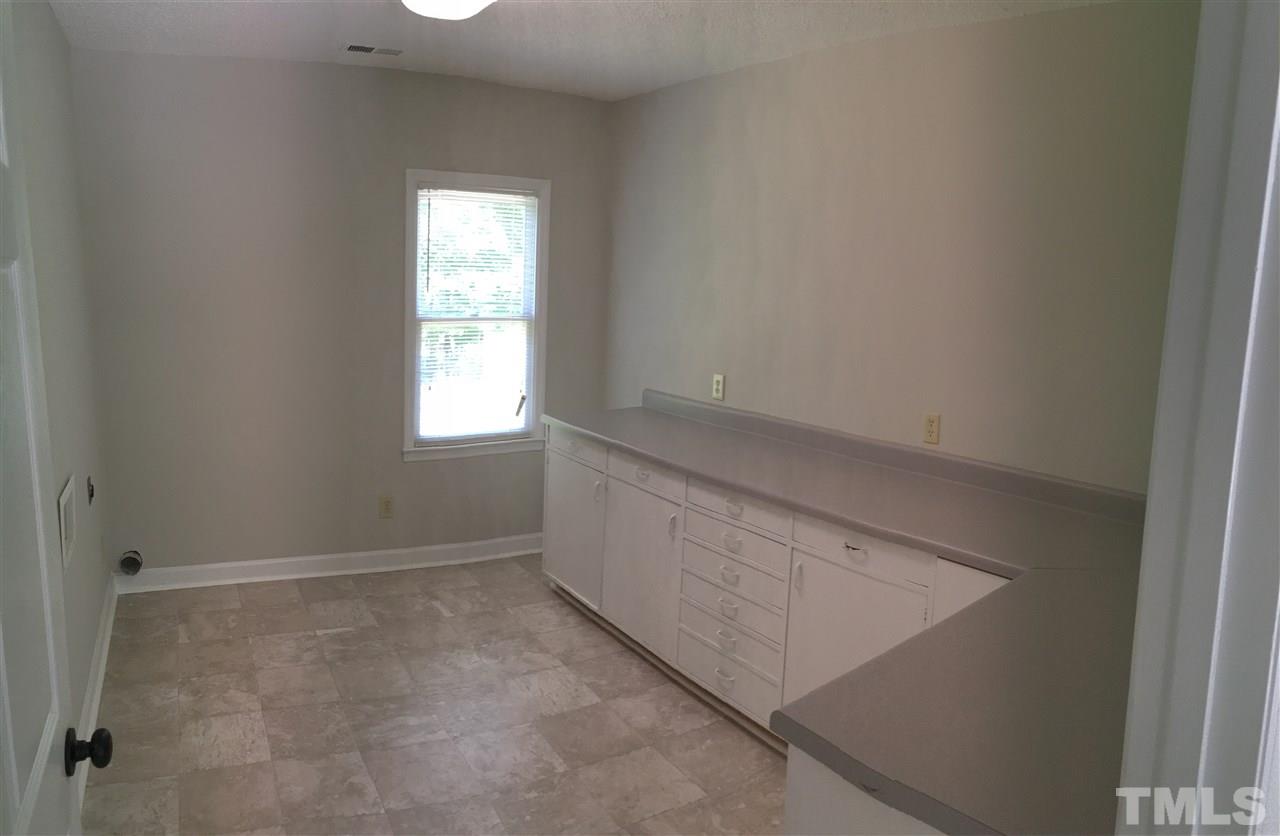 4821 Knightsbridge Way Raleigh, NC 27604 - Photo 18 of 22 an empty room with windows