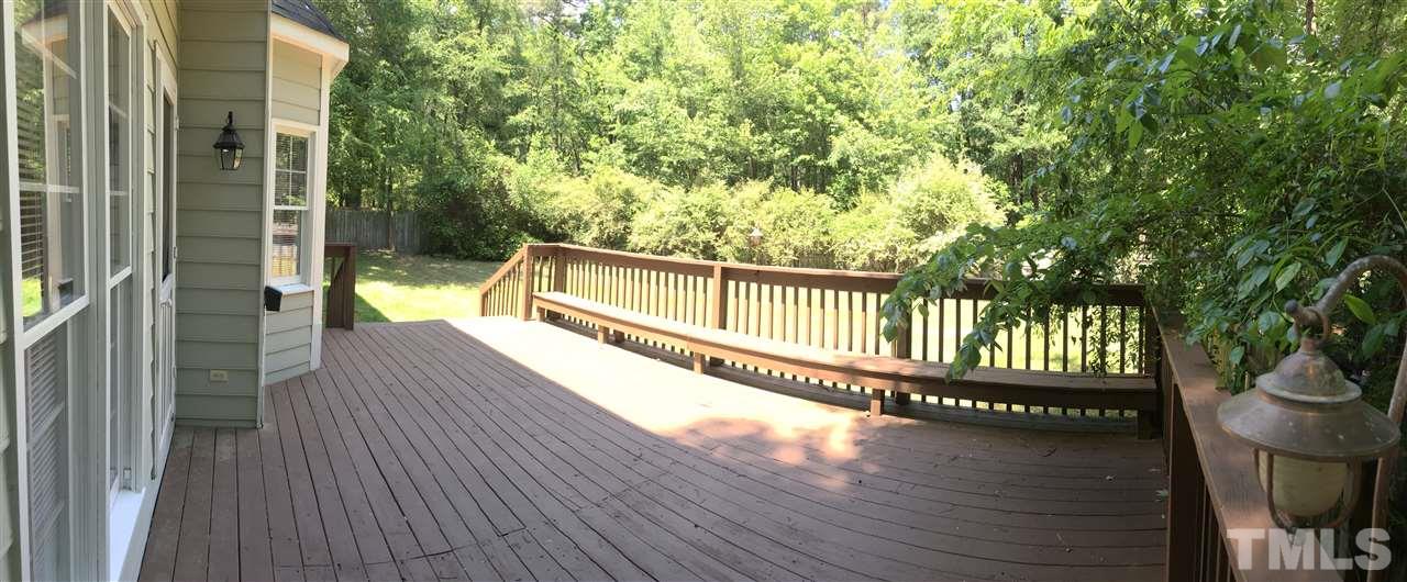 4821 Knightsbridge Way Raleigh, NC 27604 - Photo 20 of 22 a view of a balcony with wooden floor