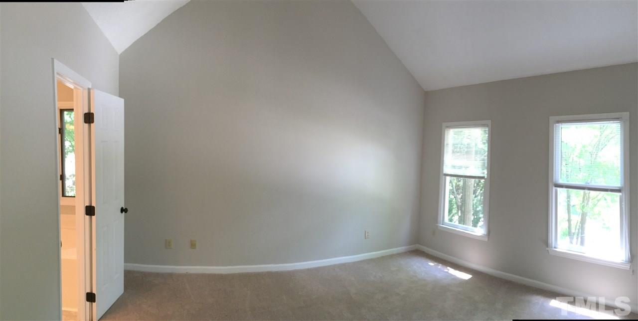 4821 Knightsbridge Way Raleigh, NC 27604 - Photo 9 of 22 an empty room with windows