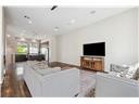 1630 Dennis Street Houston, TX 77004 - Photo 14 of 33 a living room with furniture and a flat screen tv
