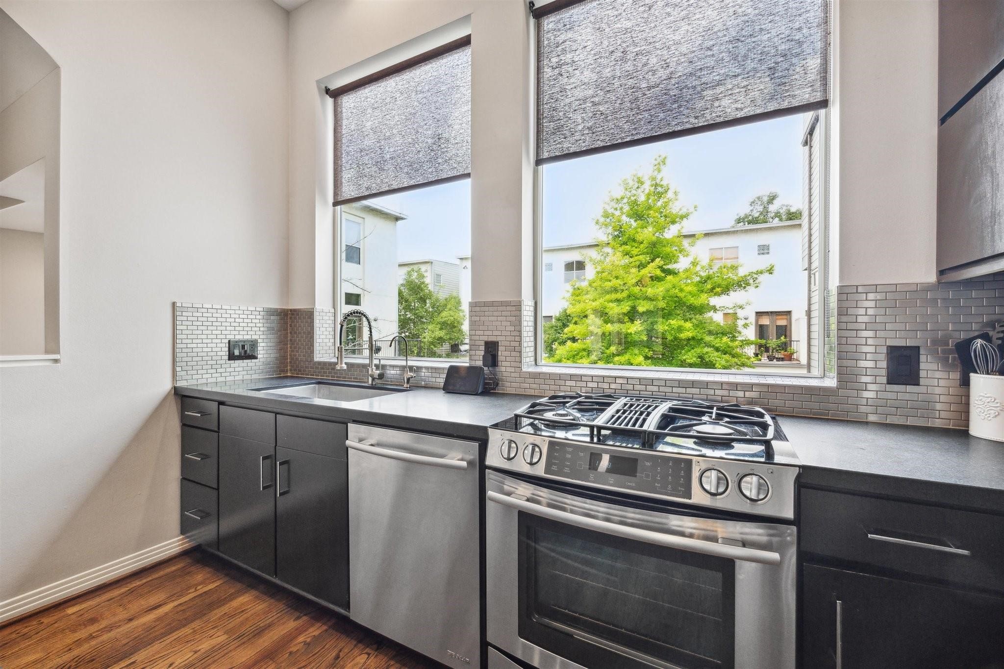 1630 Dennis Street Houston, TX 77004 - Photo 20 of 33 a view of a kitchen with a stove top oven