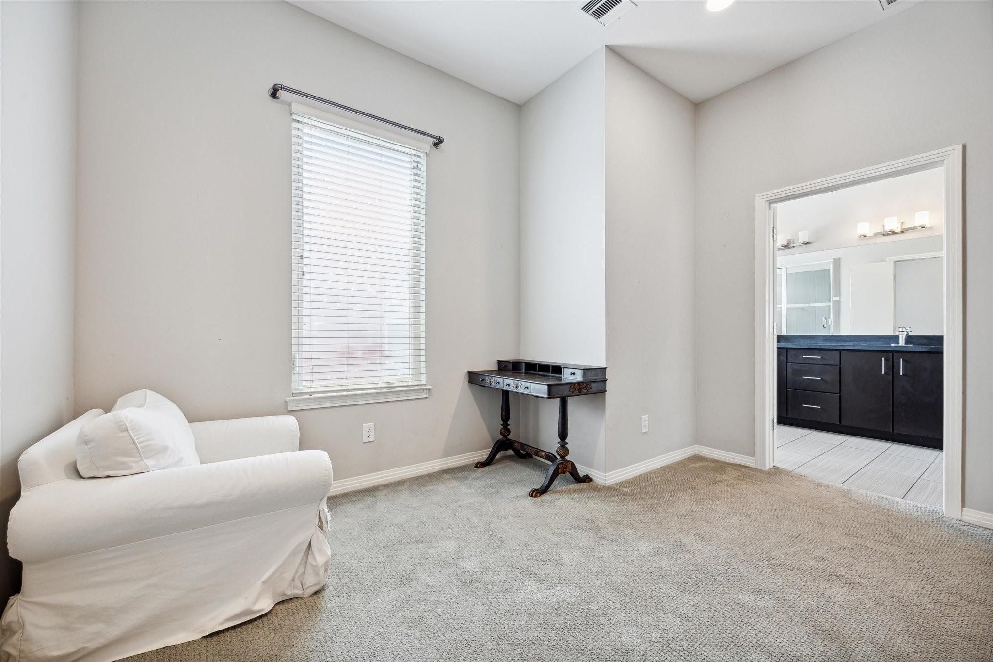 1630 Dennis Street Houston, TX 77004 - Photo 24 of 33 a living room with furniture and a window