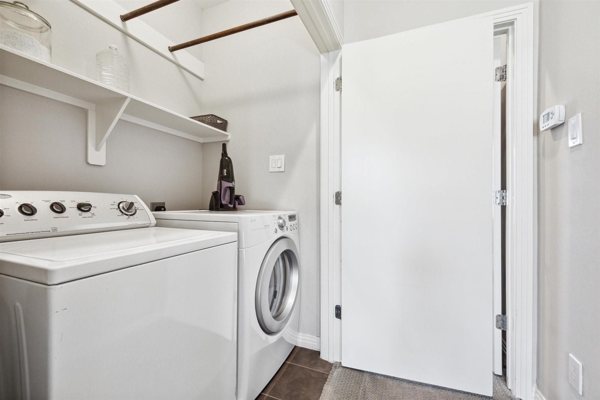 1630 Dennis Street Houston, TX 77004 - Photo 29 of 33 a utility room with dryer and washer