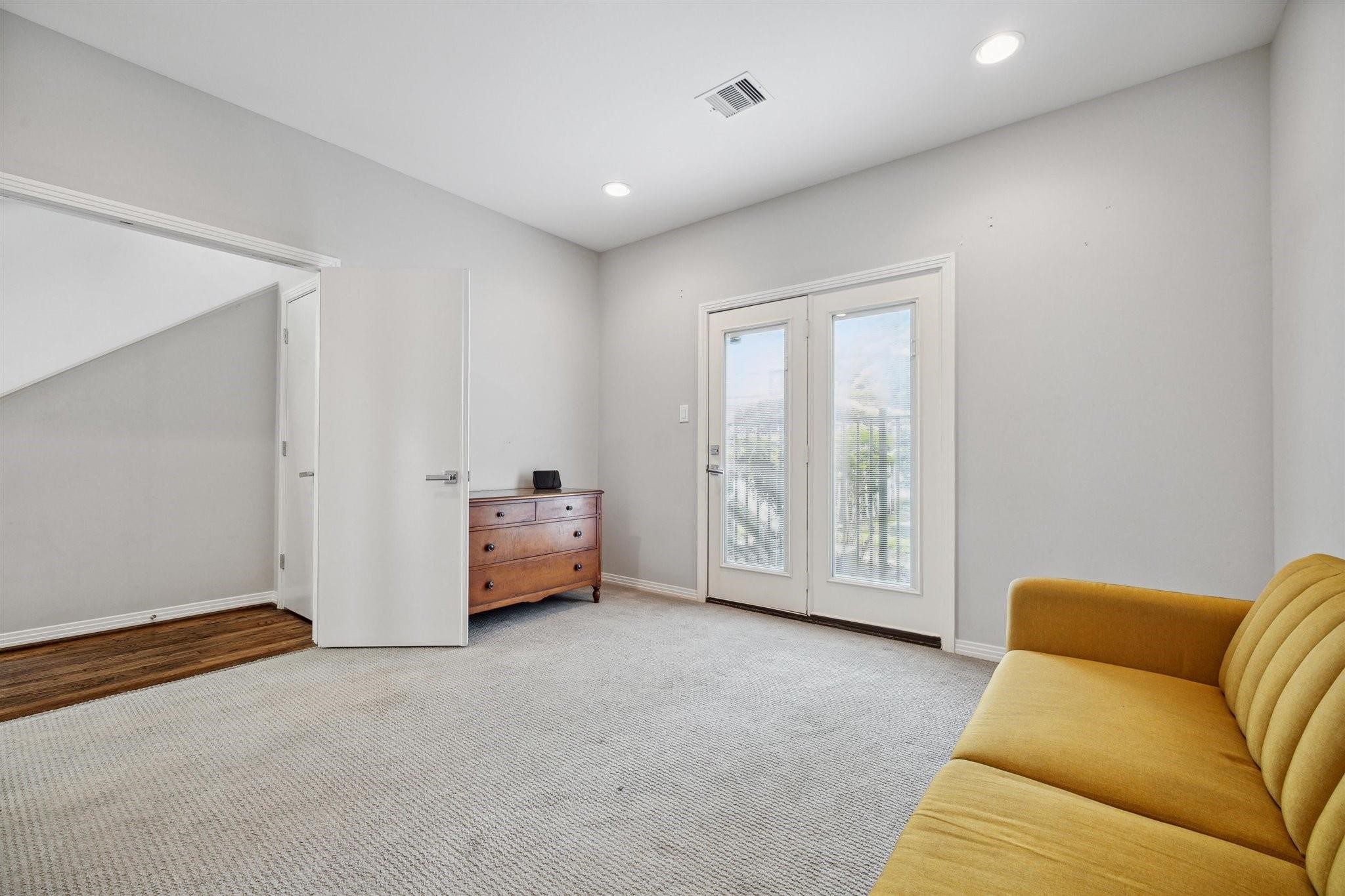 1630 Dennis Street Houston, TX 77004 - Photo 6 of 33 a living room with furniture and a window