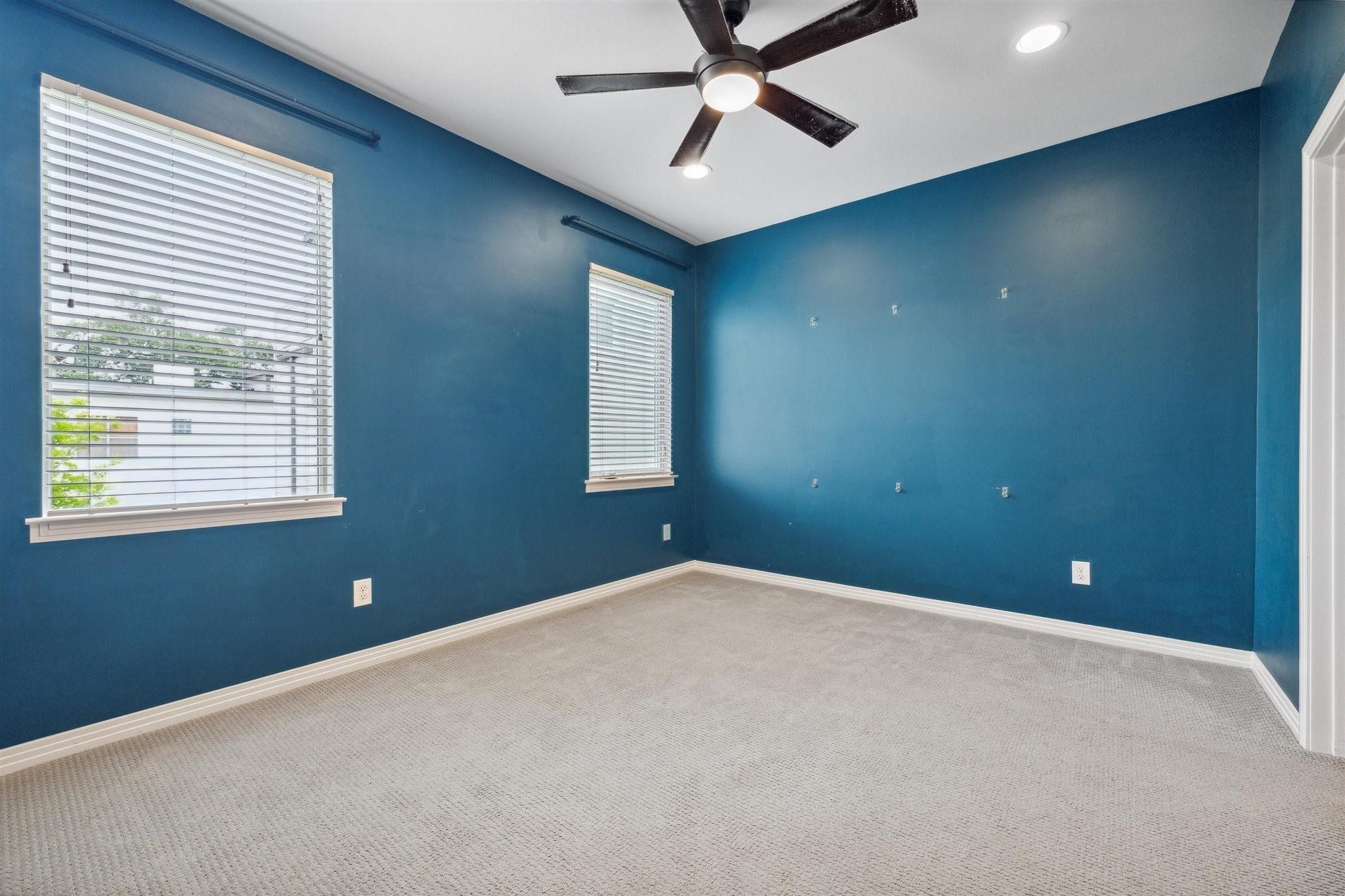 1630 Dennis Street Houston, TX 77004 - Photo 9 of 33 a view of a livingroom with a ceiling fan and window