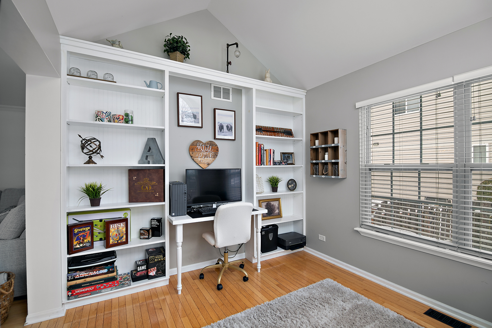 1675 Rosehall Lane Elgin, IL 60123 - Photo 20 of 49 a view of a workspace with furniture and a window