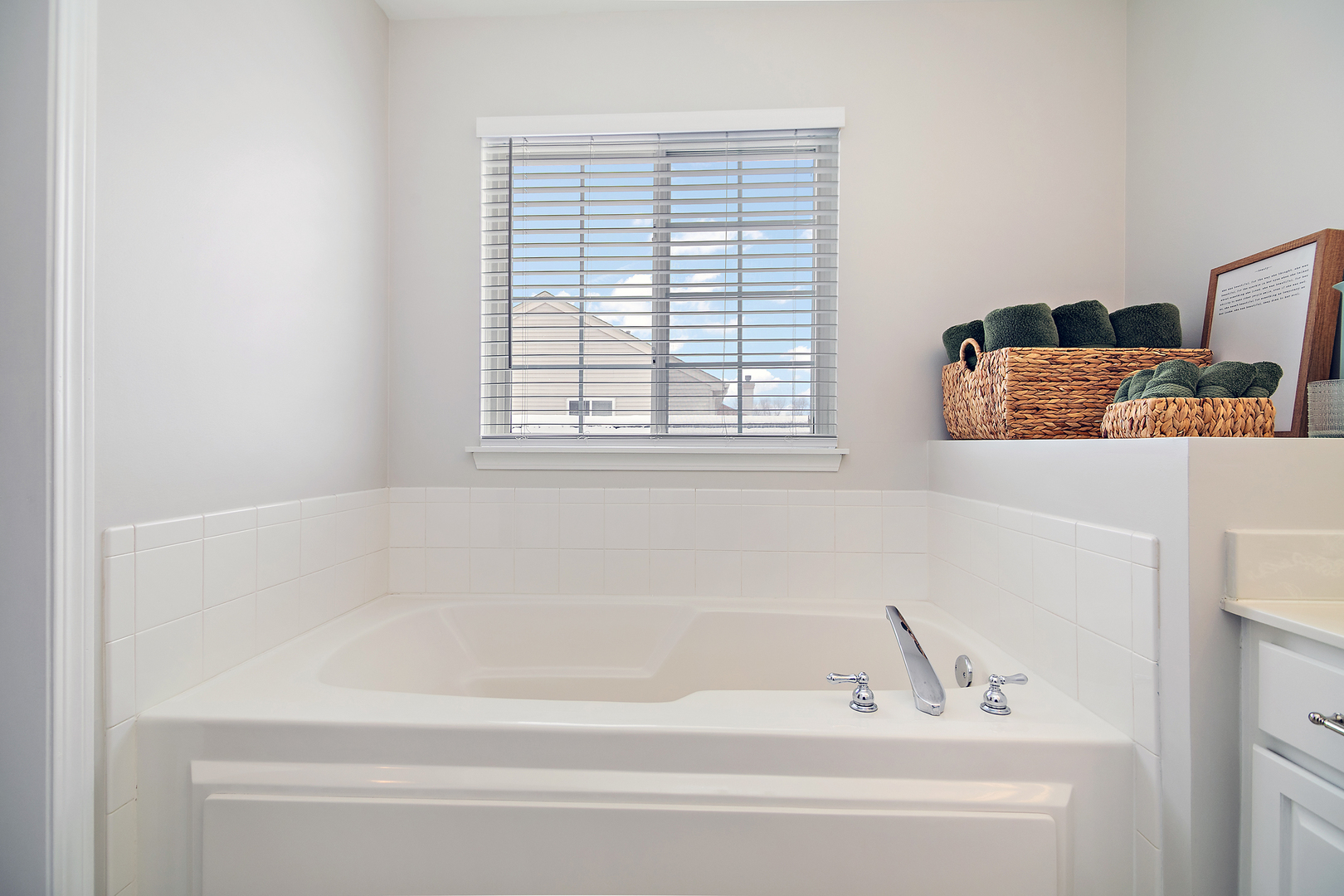 1675 Rosehall Lane Elgin, IL 60123 - Photo 27 of 49 a white bath tub sitting next to a window