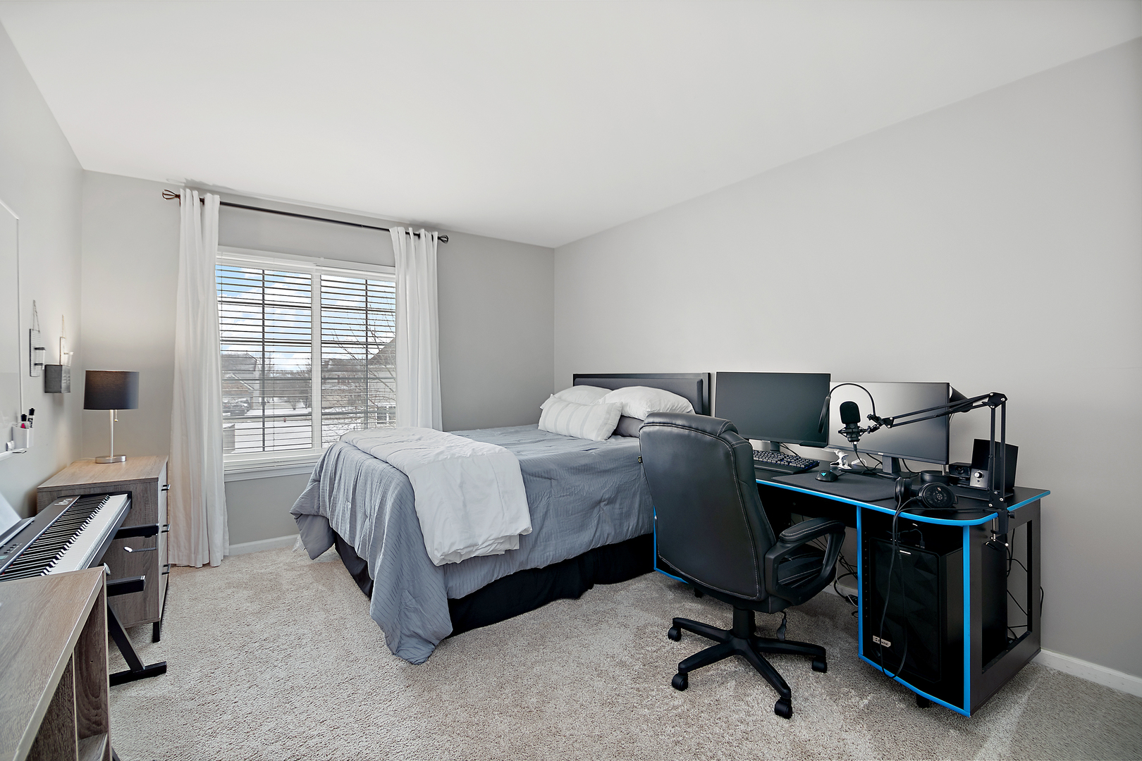 1675 Rosehall Lane Elgin, IL 60123 - Photo 28 of 49 a bedroom with a bed and a desk
