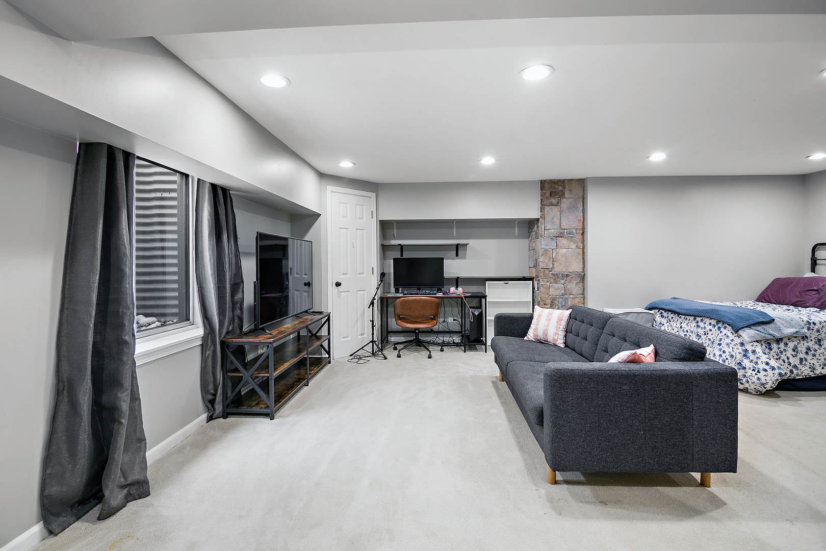 1675 Rosehall Lane Elgin, IL 60123 - Photo 33 of 49 a living room with furniture and a flat screen tv