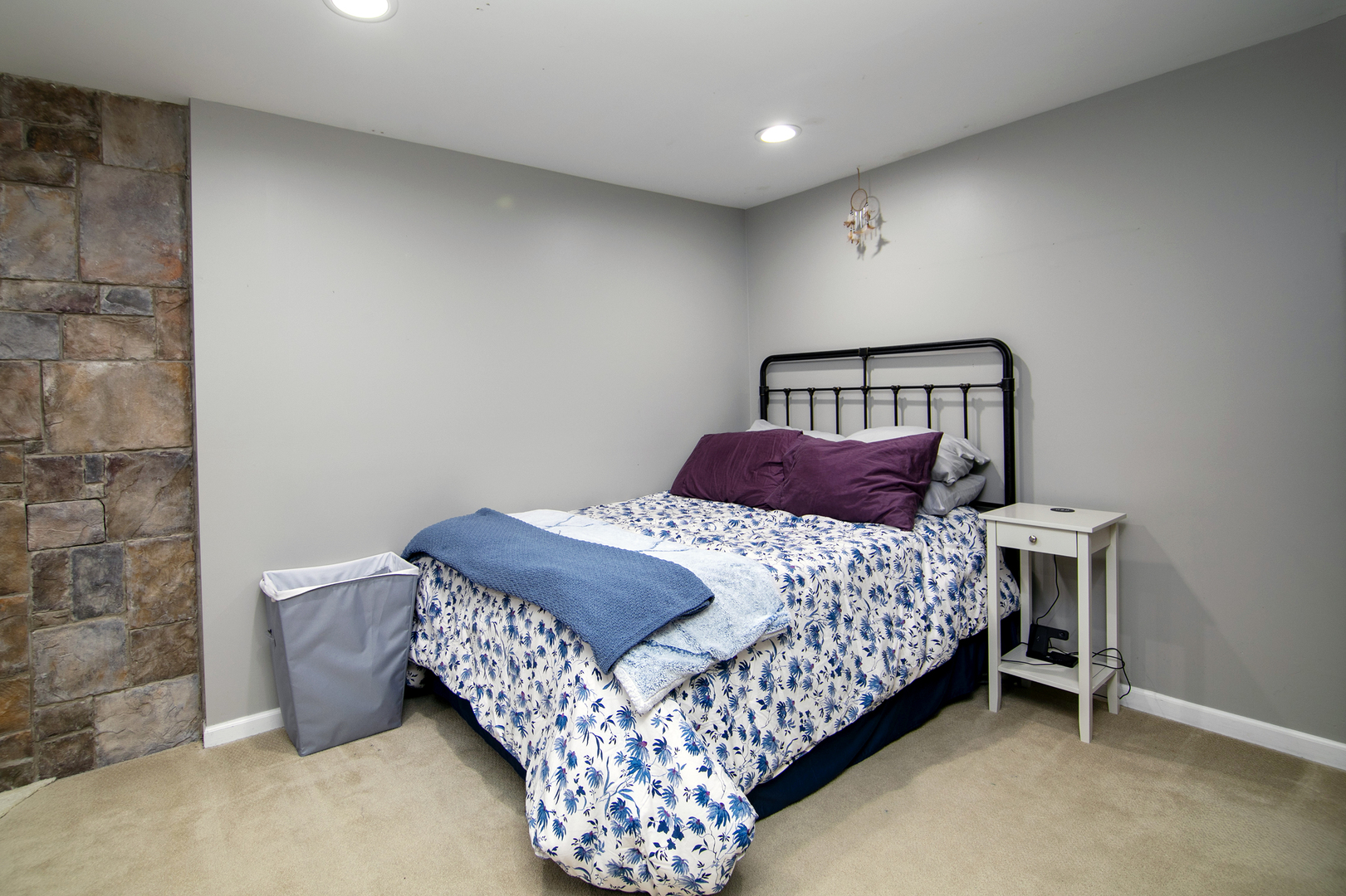 1675 Rosehall Lane Elgin, IL 60123 - Photo 36 of 49 a bedroom with a bed and a chair