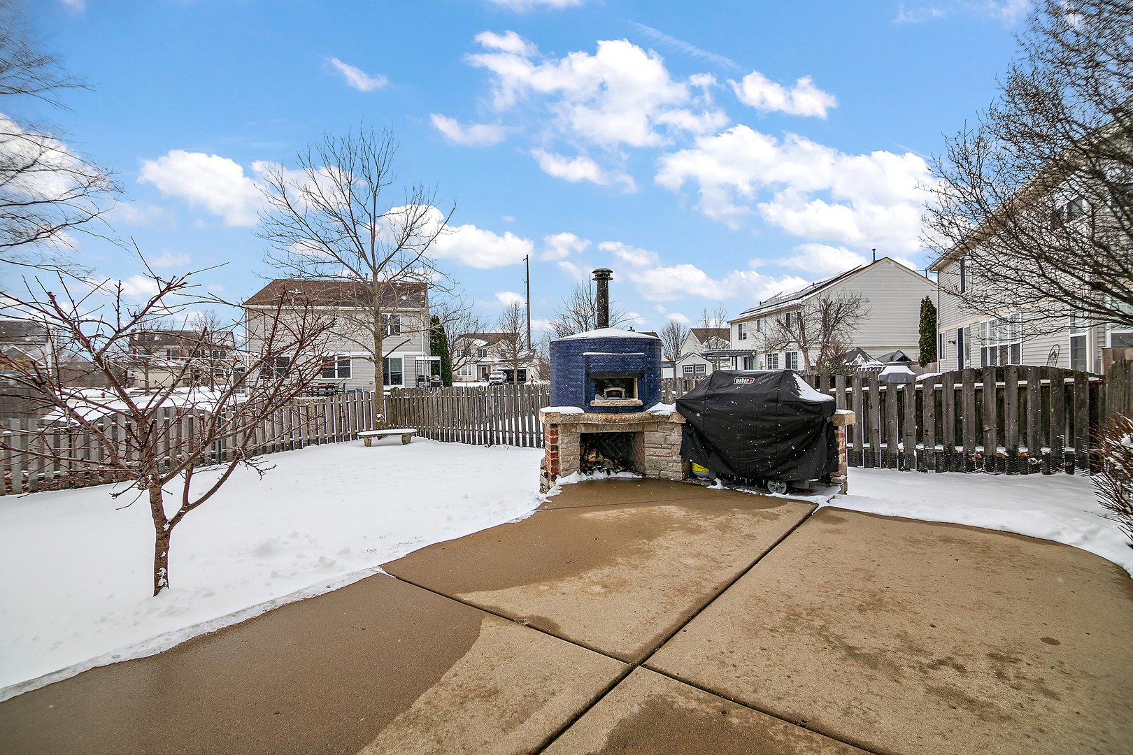 1675 Rosehall Lane Elgin, IL 60123 - Photo 39 of 49 a view of a terrace with wooden fence