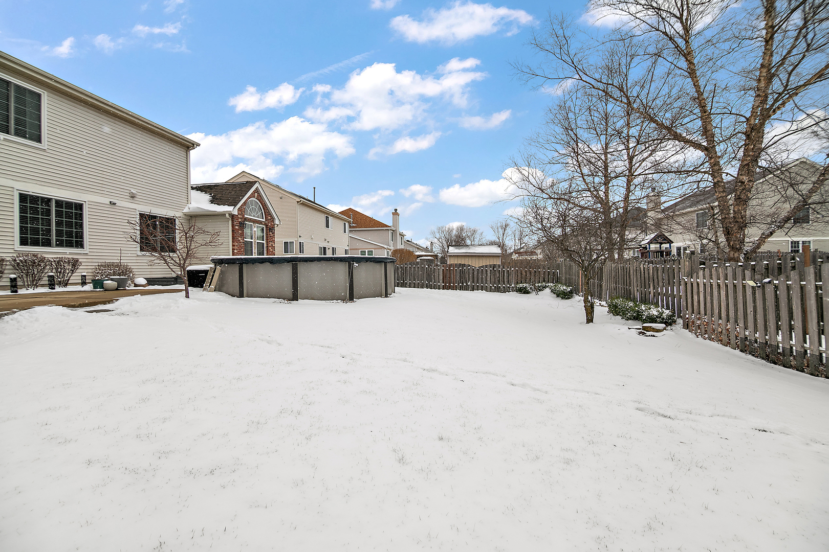 1675 Rosehall Lane Elgin, IL 60123 - Photo 41 of 49 a view of a yard with a house