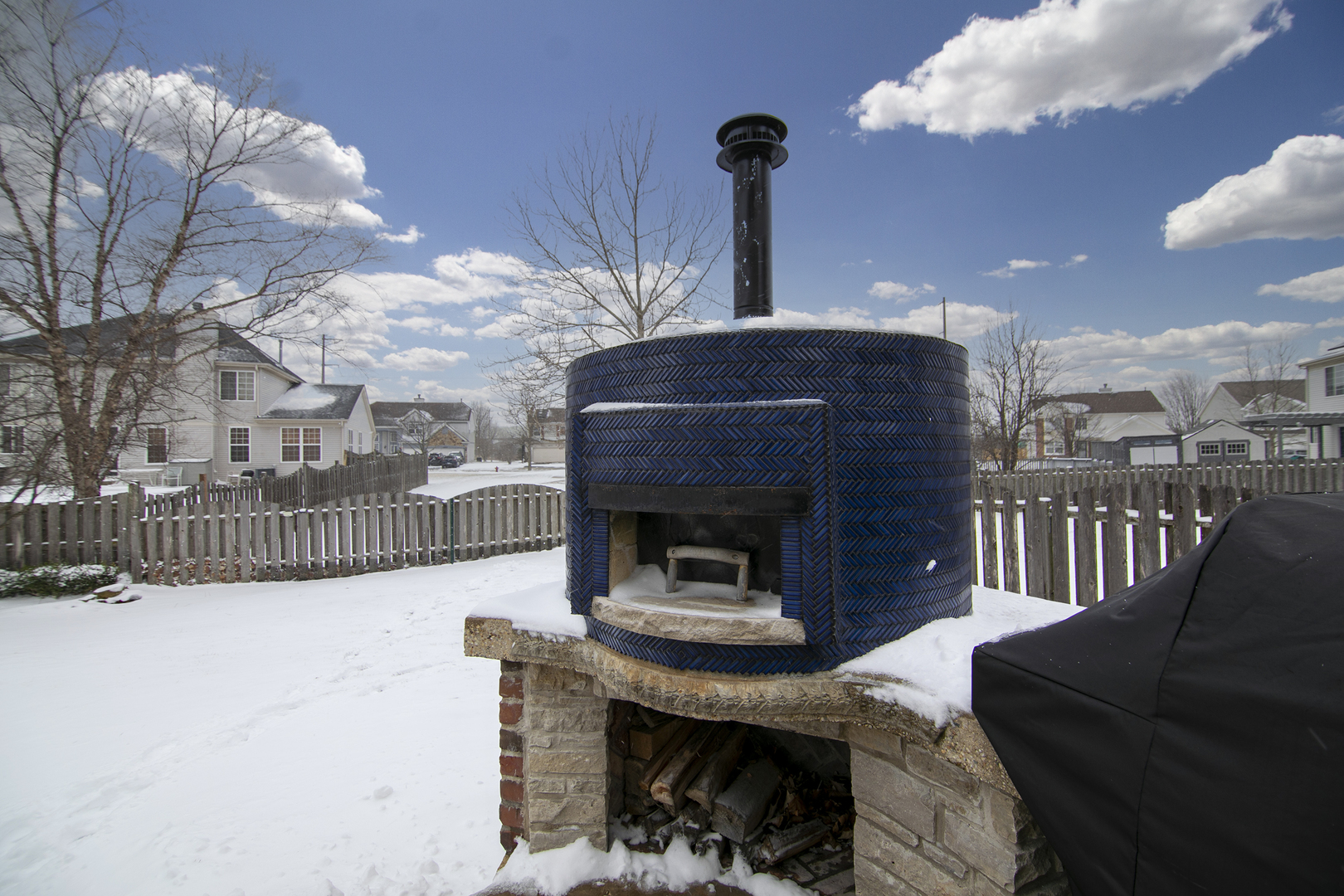 1675 Rosehall Lane Elgin, IL 60123 - Photo 42 of 49 a living room with furniture a fireplace and a chandelier