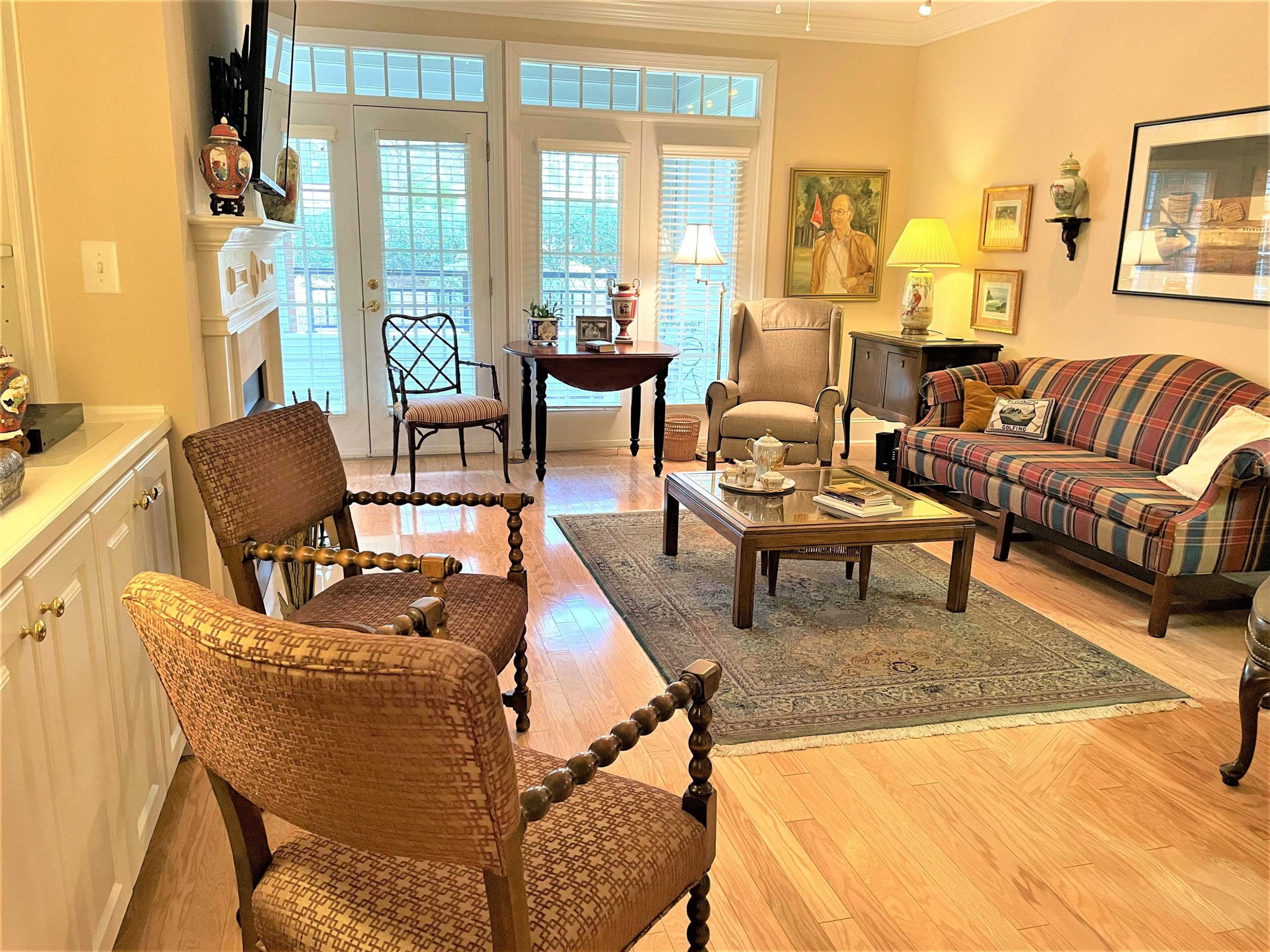 3700 Baron Cooper Pass, Unit 103 Raleigh, NC 27612 - Photo 4 of 24 Living Room View from Dining Room