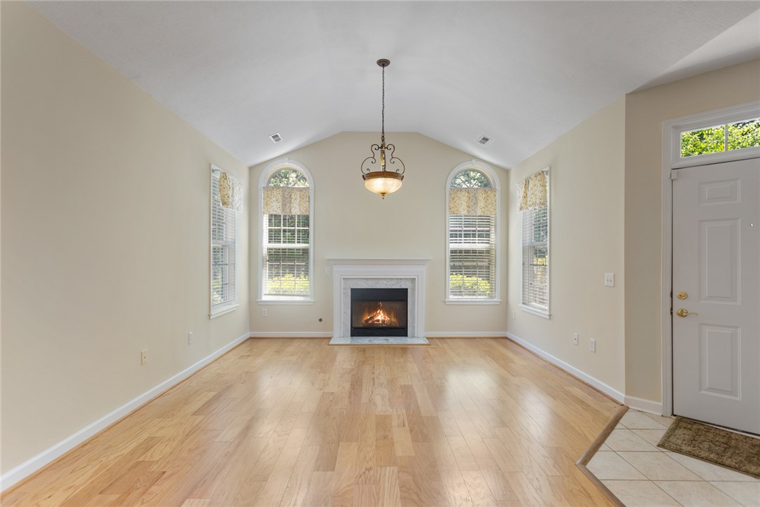 155 Life Style Lane Anderson, SC 29621 - Photo 9 of 49 This inviting living space features gleaming wood floors and a cozy fireplace.
