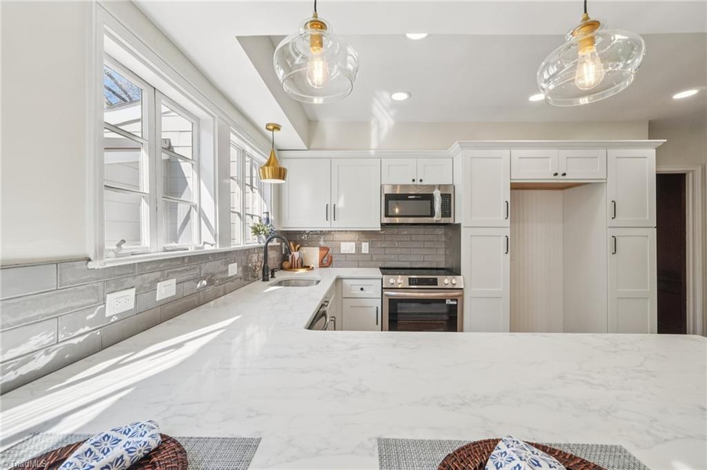 907 Sunset Drive High Point, NC 27262 - Photo 12 of 50 Vitamin D served Daily ~ streaming natural light is breathtaking!