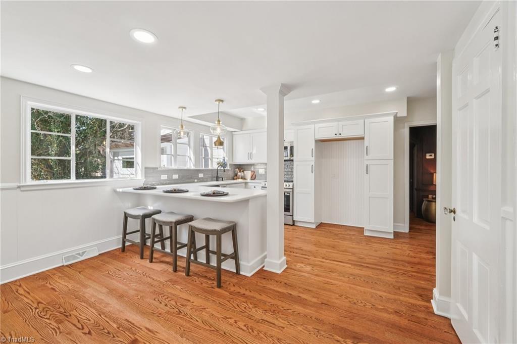 907 Sunset Drive High Point, NC 27262 - Photo 16 of 50 Love the "Wall of Windows" in the Kitchen!
