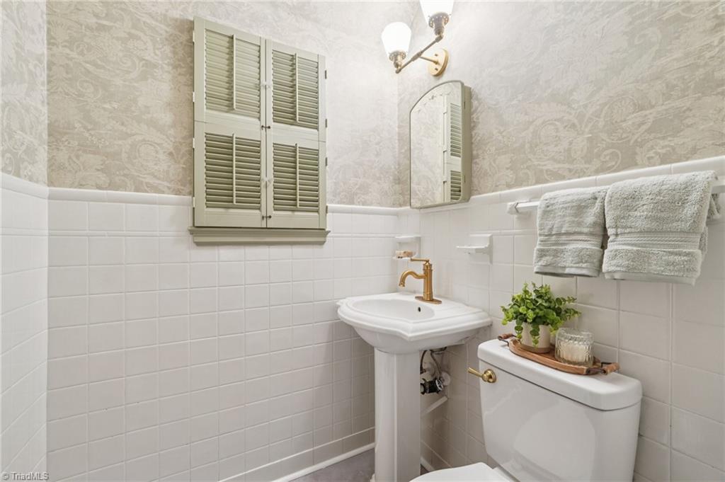 907 Sunset Drive High Point, NC 27262 - Photo 20 of 50 Powder Room keeps to the old world charm