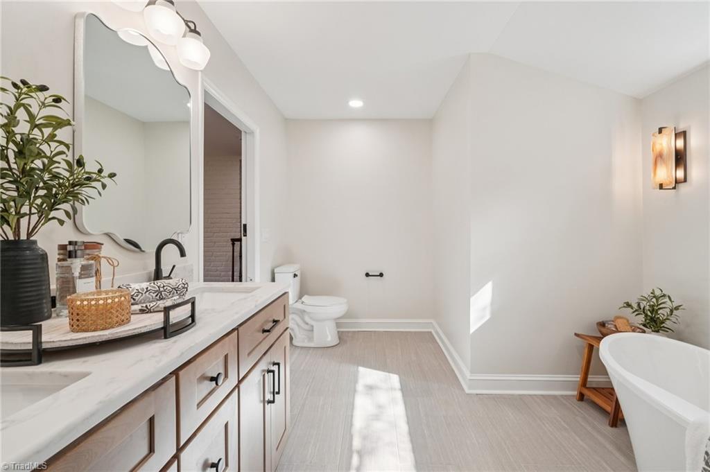 907 Sunset Drive High Point, NC 27262 - Photo 24 of 50 Unwind and reset in the Spa Like Bath