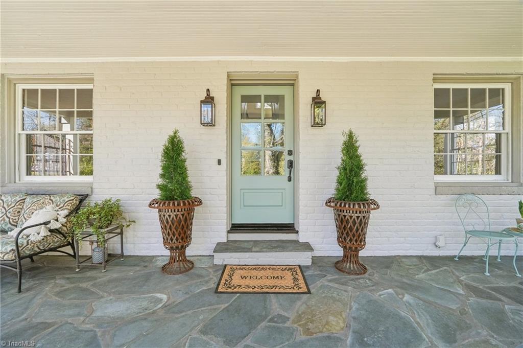 907 Sunset Drive High Point, NC 27262 - Photo 3 of 50 Porch Rules: Relax, Recharge, Repeat.