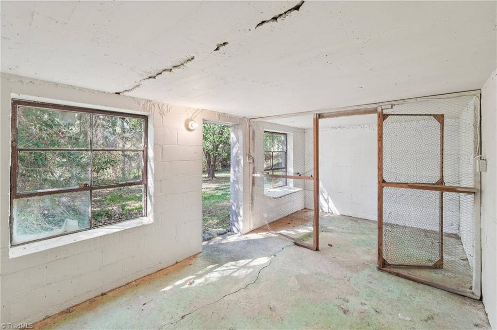 907 Sunset Drive High Point, NC 27262 - Photo 48 of 50 Versatile Workshop/Coop Space! Tucked behind garage!