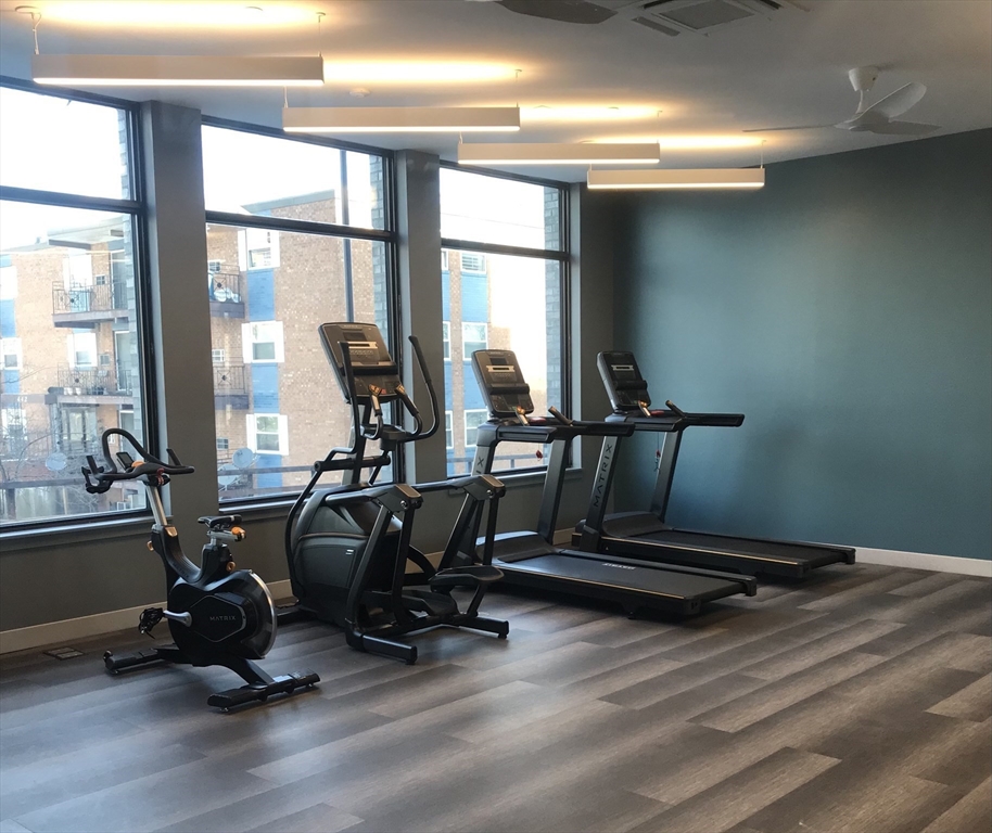 466 River Street, Unit 528 Boston, MA 02126 - Photo 11 of 19 a view of a room with gym equipment