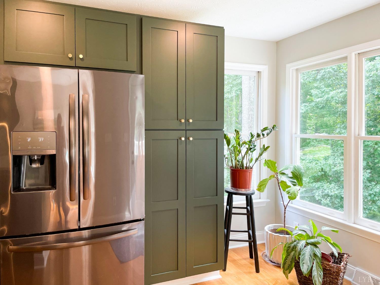 4512 Roaring Run Road Goode, VA 24556 - Photo 16 of 54 a kitchen with stainless steel appliances a refrigerator and a window