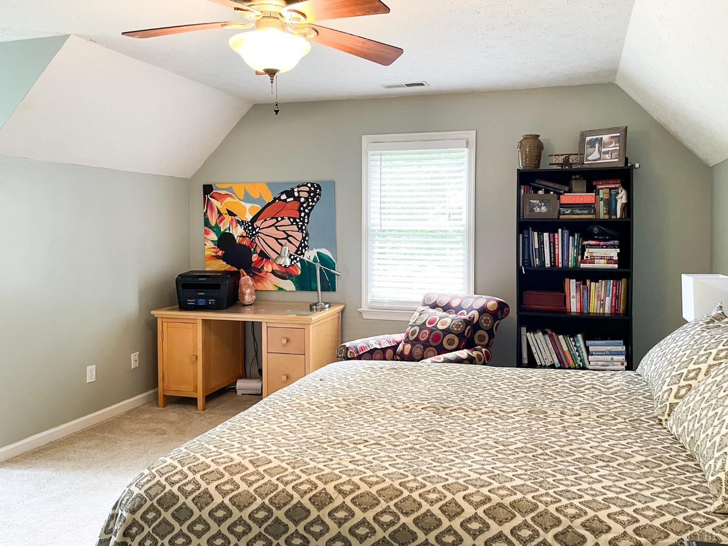 4512 Roaring Run Road Goode, VA 24556 - Photo 40 of 54 a bedroom with a bed and a book shelf