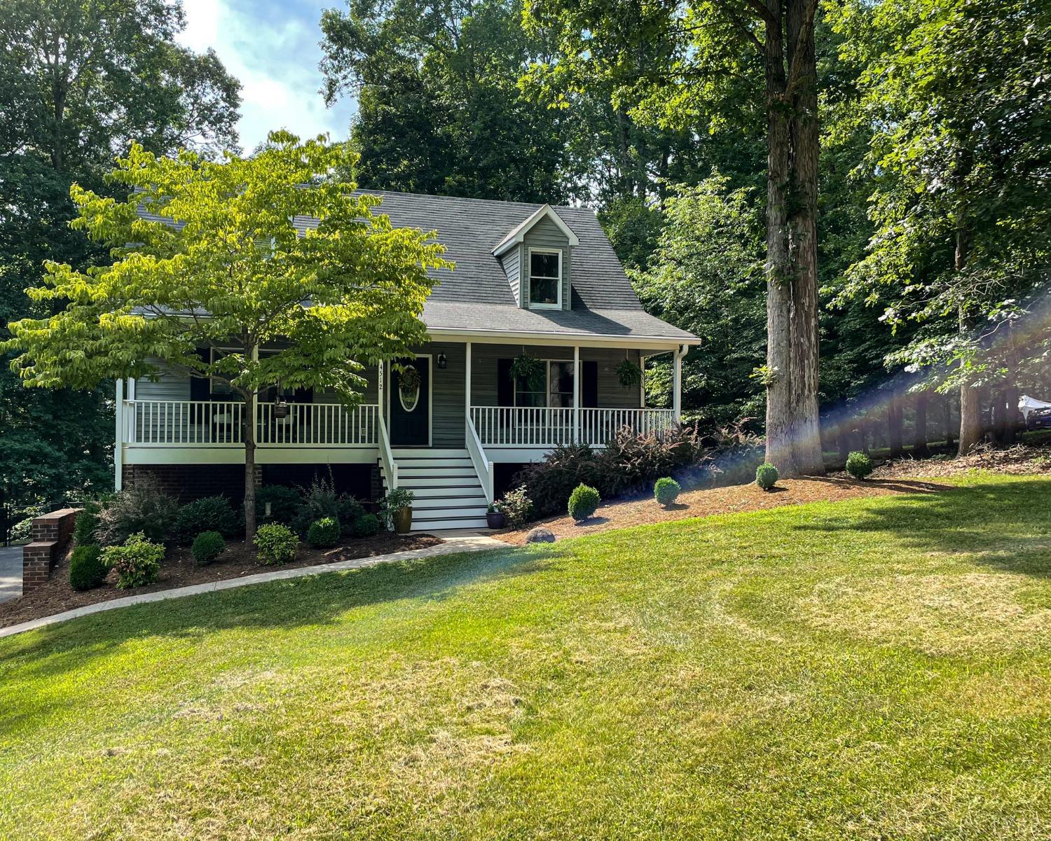 4512 Roaring Run Road Goode, VA 24556 - Photo 4 of 54 a view of a house with swimming pool and sitting area