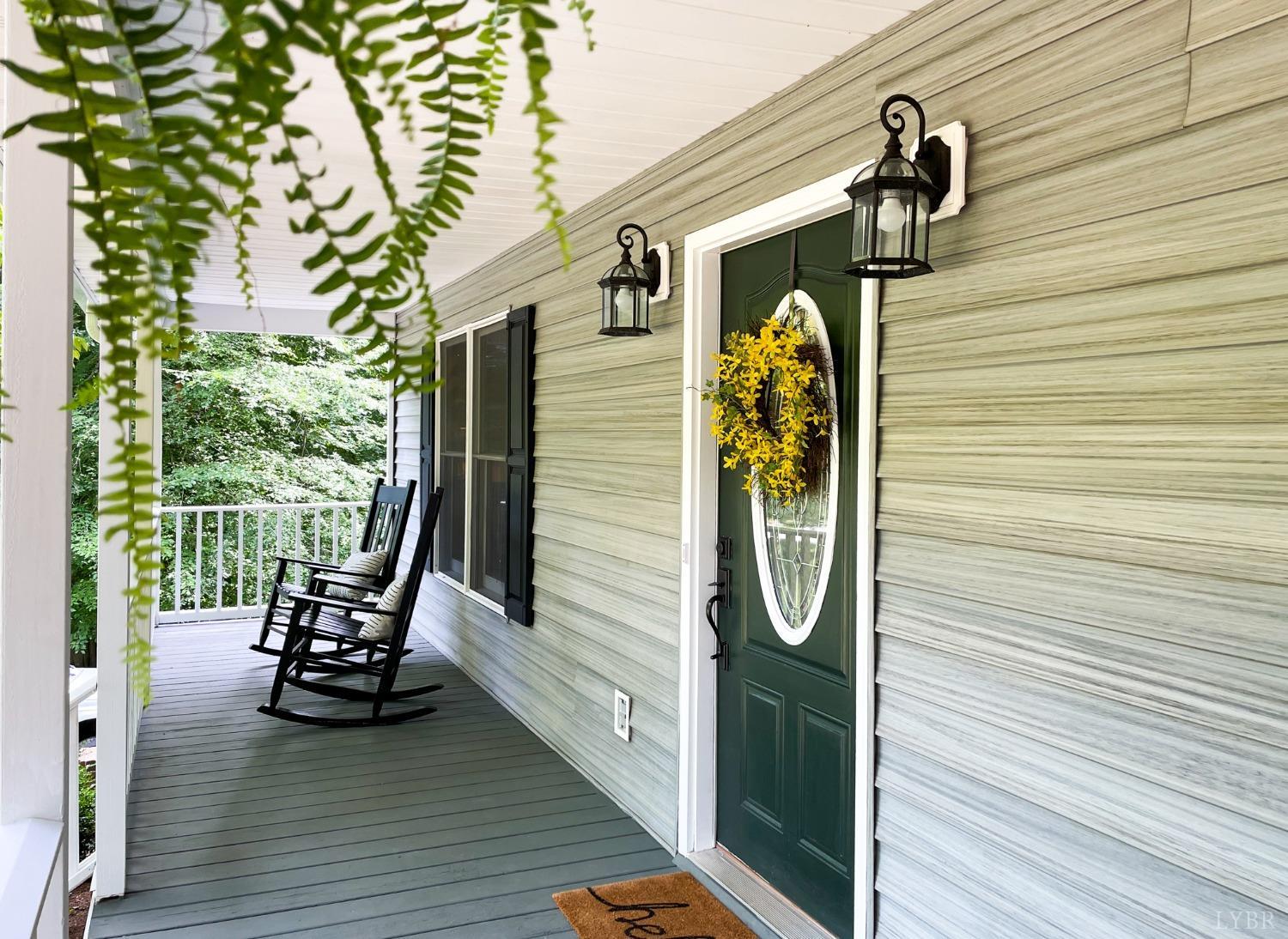 4512 Roaring Run Road Goode, VA 24556 - Photo 5 of 54 a view of a chairs in wooden deck