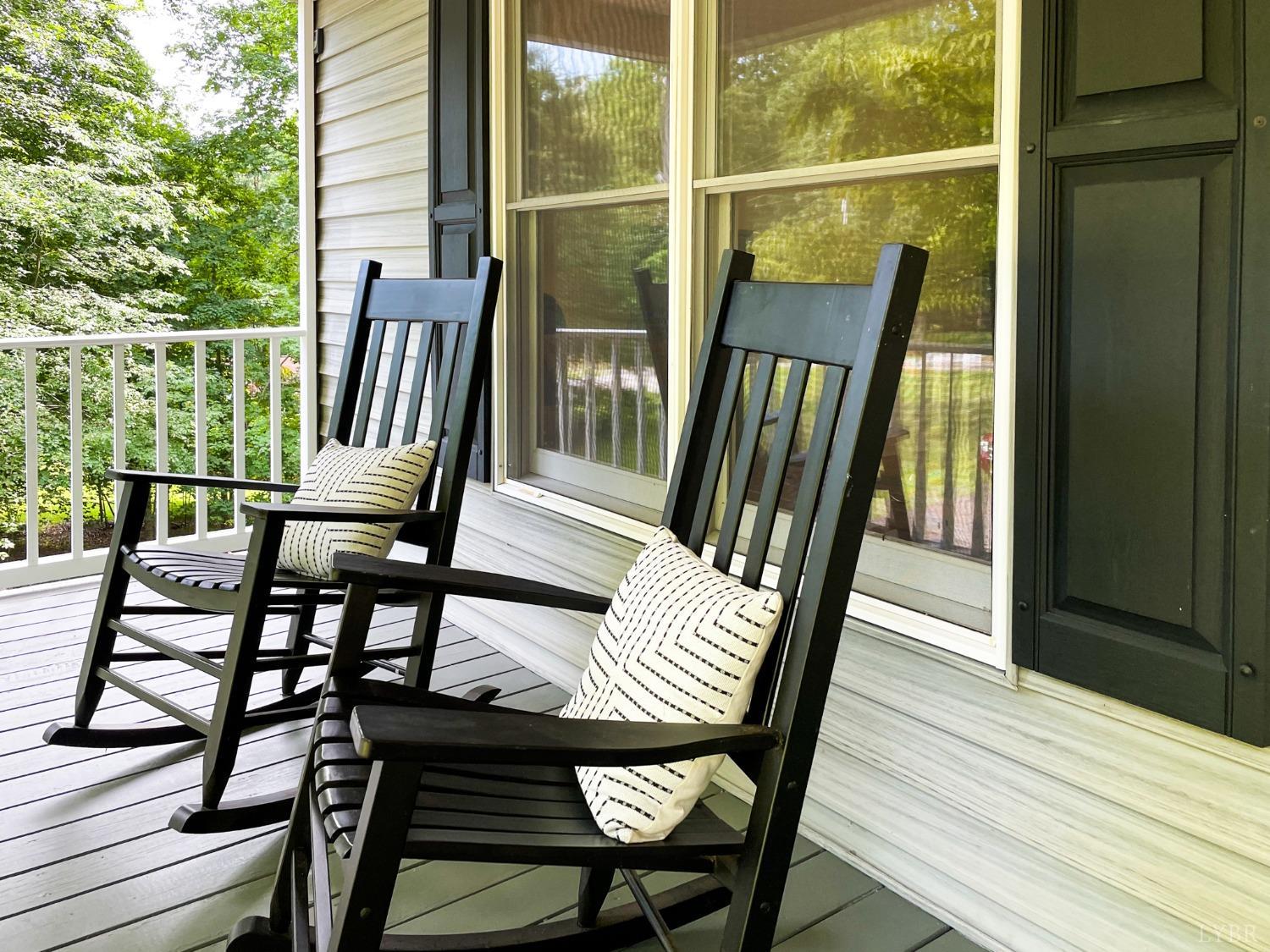 4512 Roaring Run Road Goode, VA 24556 - Photo 6 of 54 a view of a chairs on the balcony