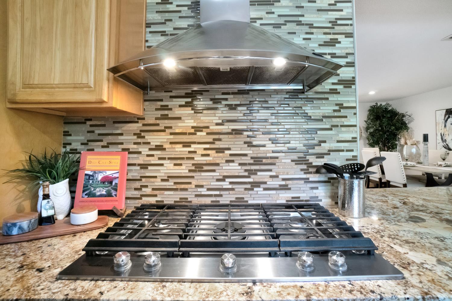 6299 Horseshoe Bar Road Loomis, CA 95650 - Photo 10 of 43 a stove top oven sitting inside of a kitchen