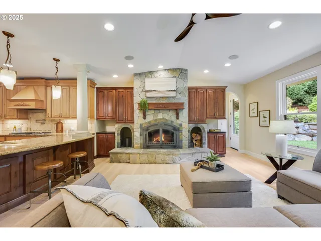 a view of a kitchen with furniture and a fireplace