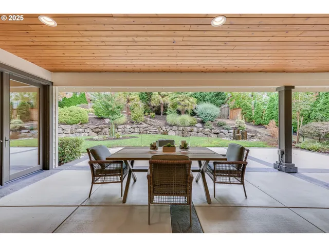 a stove top oven sitting inside of a kitchen
