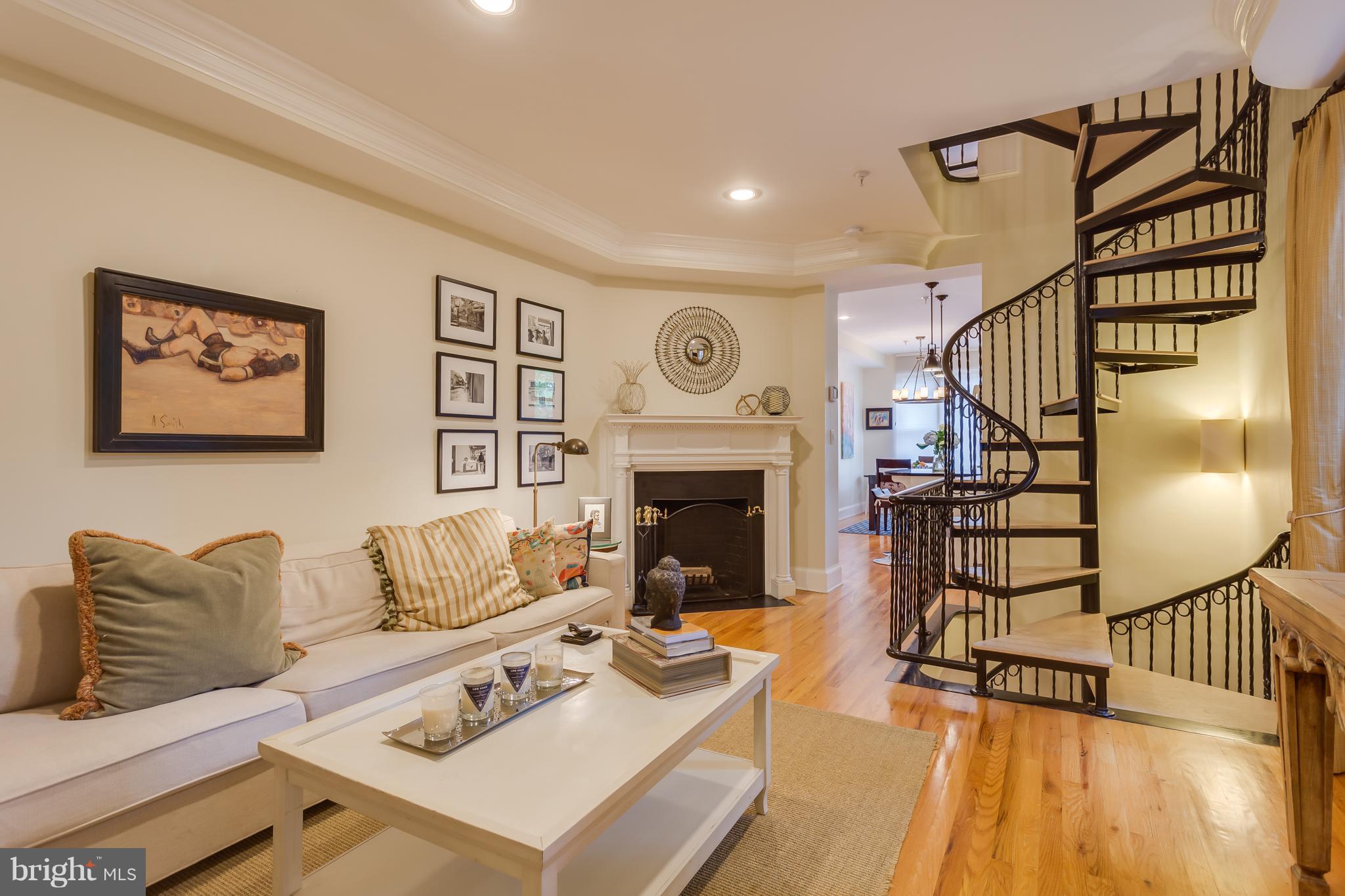 1603 16th Street Northwest, Unit 3 Washington, DC 20009 - Photo 15 of 30 a living room with furniture and wooden floor