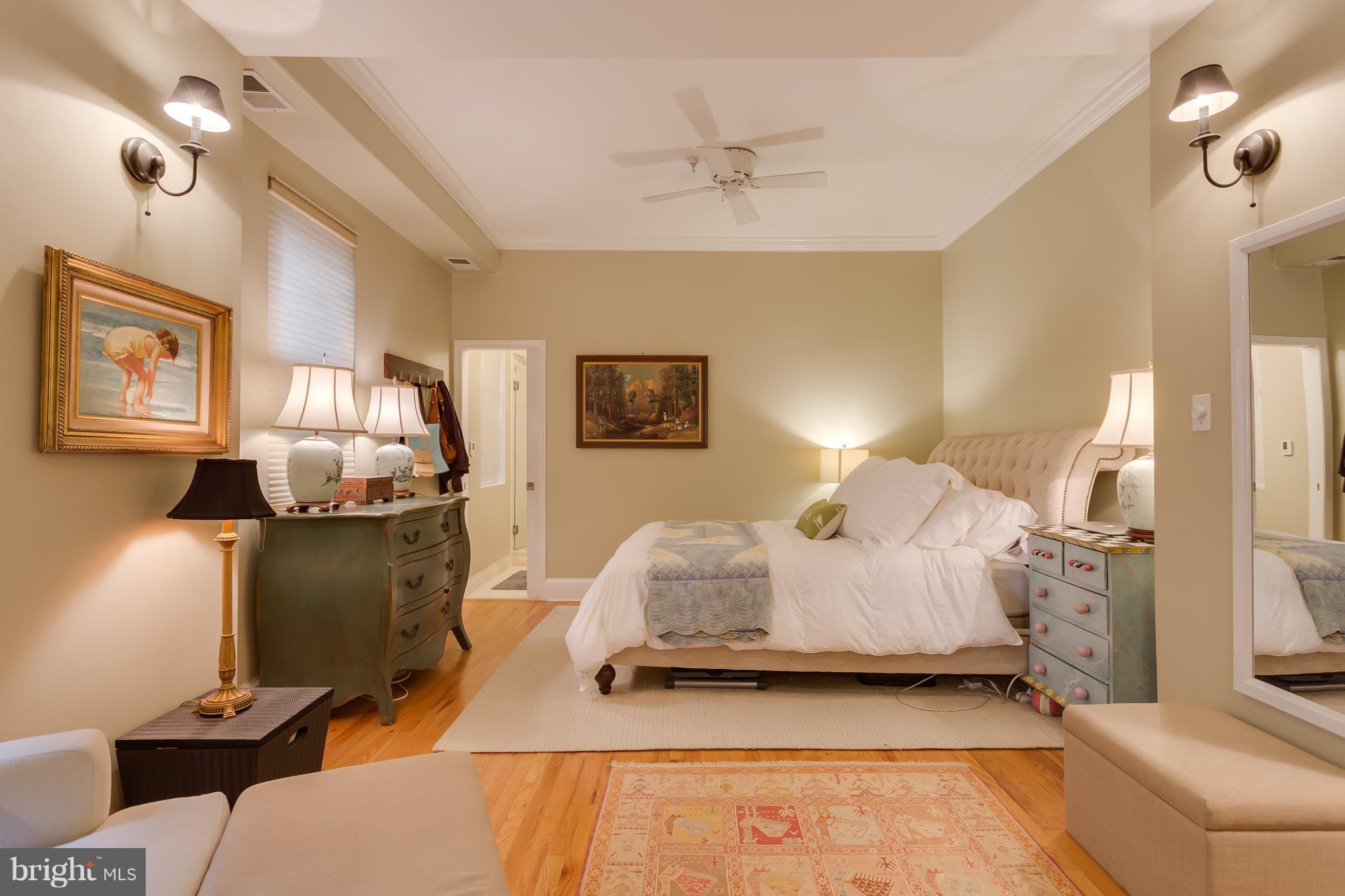 1603 16th Street Northwest, Unit 3 Washington, DC 20009 - Photo 18 of 30 a bedroom with bed and window