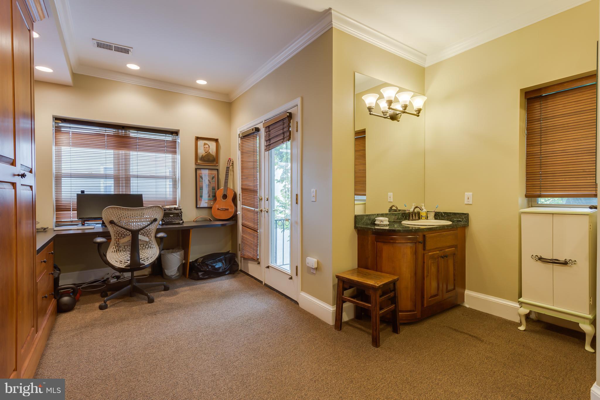 1603 16th Street Northwest, Unit 3 Washington, DC 20009 - Photo 22 of 30 a view of a room with gym equipment