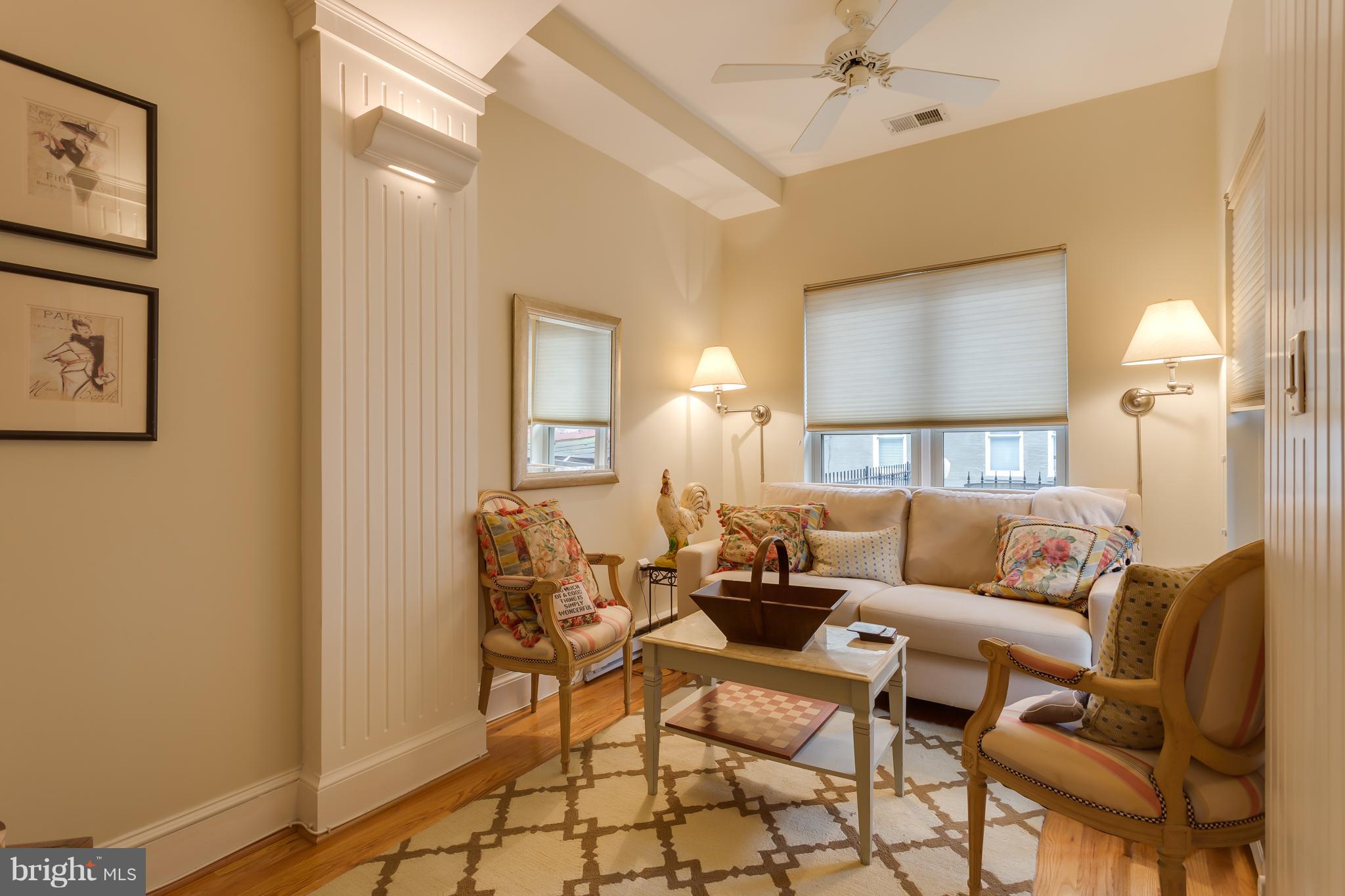 1603 16th Street Northwest, Unit 3 Washington, DC 20009 - Photo 23 of 30 a living room with furniture and a window