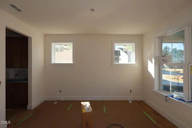 an empty room with windows
