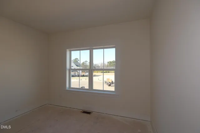 an empty room with a window