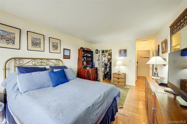 a bathroom with a sink mirror vanity and toilet