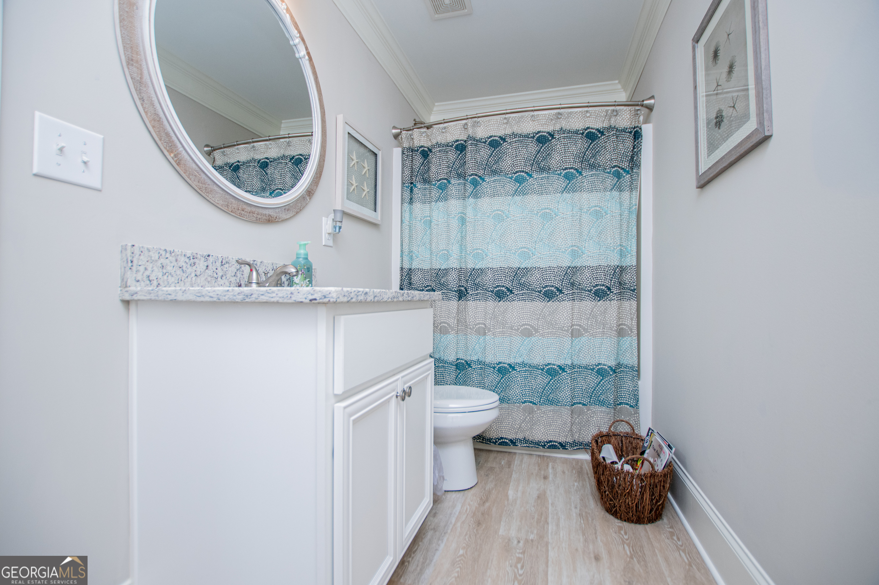 216 Yorkshire Lane Villa Rica, GA 30180 - Photo 66 of 94 a bathroom with a sink a toilet and a mirror