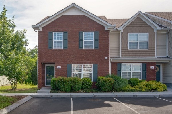 1990 Shaylin Loop Antioch, TN 37013 - Photo 2 of 20 a front view of a house with a yard