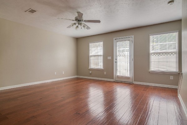 1990 Shaylin Loop Antioch, TN 37013 - Photo 5 of 20 a view of an empty room with a window and wooden floor
